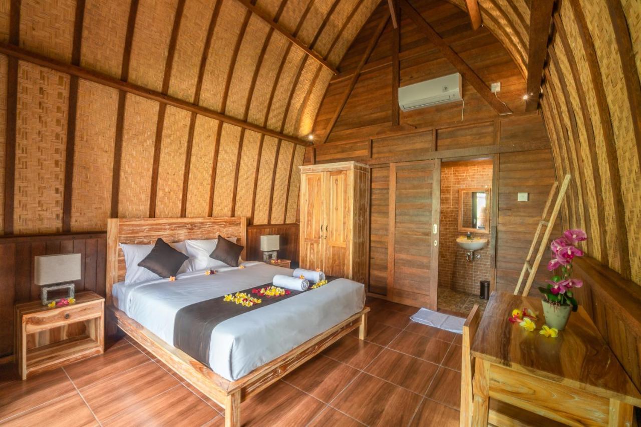 Wooden Puri Guesthouse Uluwatu Exterior foto
